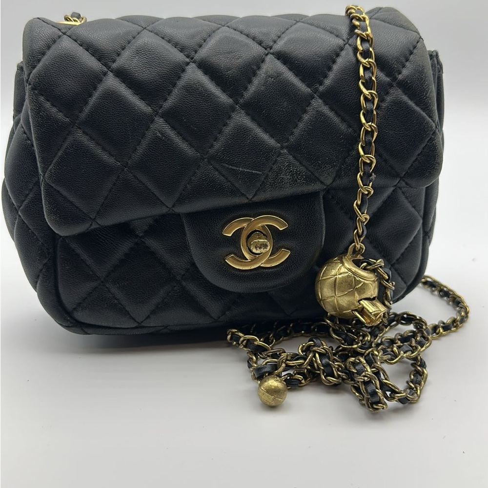 CHANEL Black Quilted Mini Bag with Gold Chain